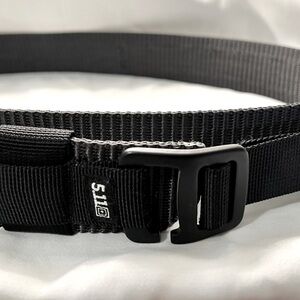 5.11 tactical belt. Black/gray. Size 32-34”( will expand to 35.5”).  1.5” width.